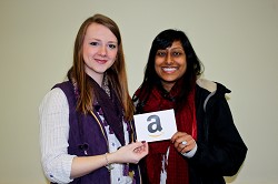 Winner Priya Motupalli receives her prize from Janine Heath, from the Harper Adams communications team