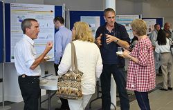 Delegates meet at the conference. Delegates meet at the conference.
