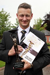 David Nuttall with the Catey Award David Nuttall with the Catey Award