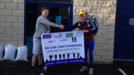 Alumnus carrying cask of ale 100 miles to Harper Adams