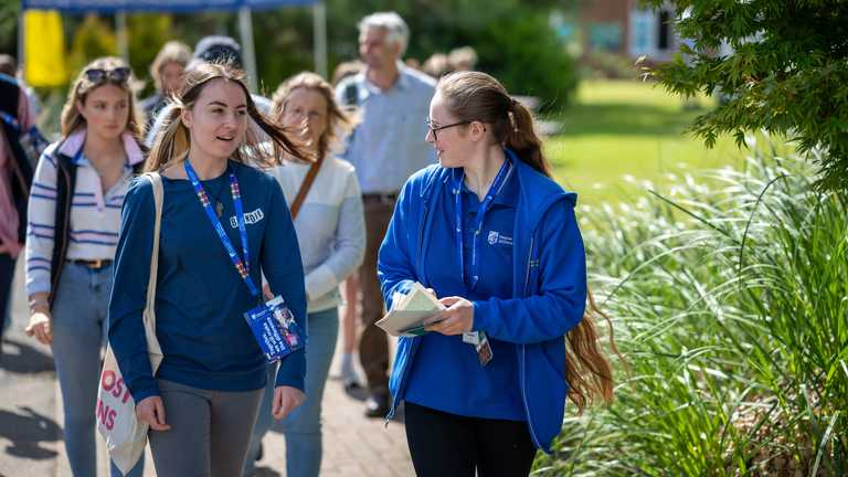 A prospective student chats to an Ambassador at an Open Day