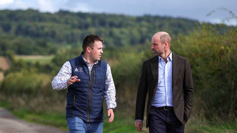 Harry Davies and His Royal Highness Prince William, The Duke of Cornwall, in conversation at Monkhall Farm