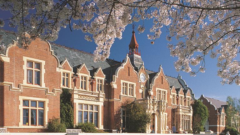 The Ivey Building at Lincoln University, New Zealand with blossom outside