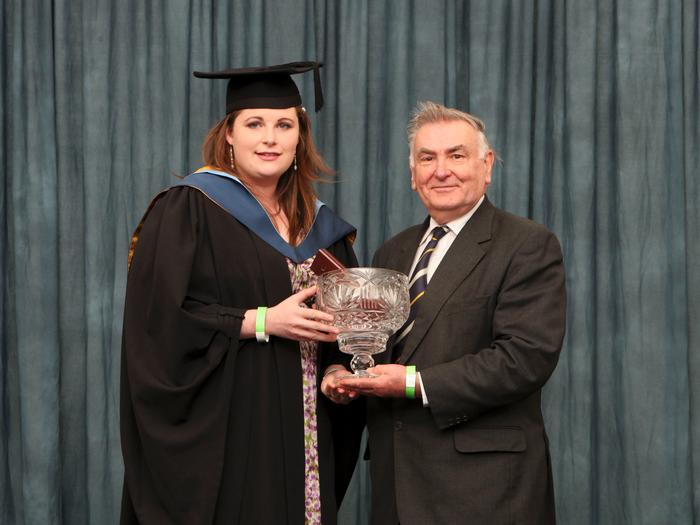 Basil Bayne congratulates Pamela Cousins