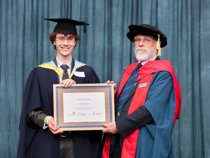 Aidan Thomas receives the BCPC Award from Professor Simon Leather