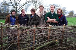The students with their finished hedge