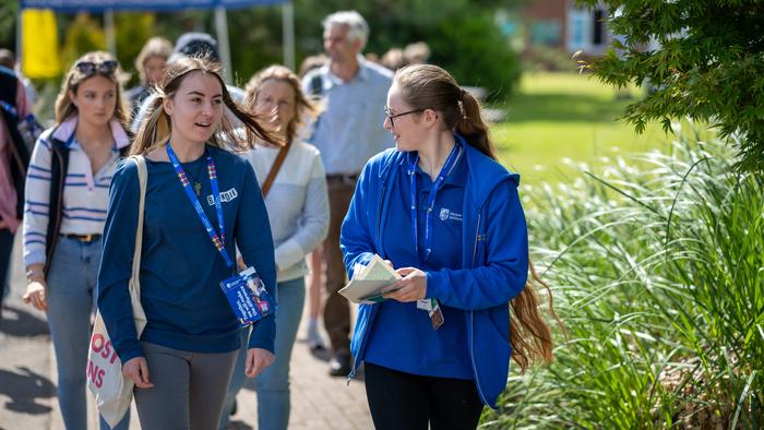 A prospective student chats to an Ambassador at an Open Day