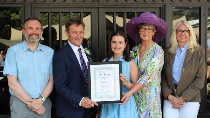 Nerys Parry receives her award from Royal Welsh SHow President 2026 Gethin Harvard with, from left, Harper Adams University Vice-Chancellor Professor Michael Lee, Ceri Harvard DL, and Harper Adams University Director of Development and Alumni Relations Doris Taylor