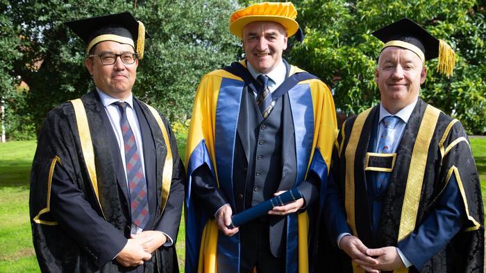 Tullis Mason with outgoing Chair Dominic Won and University Vice-Chancellor Professor Ken Sloan
