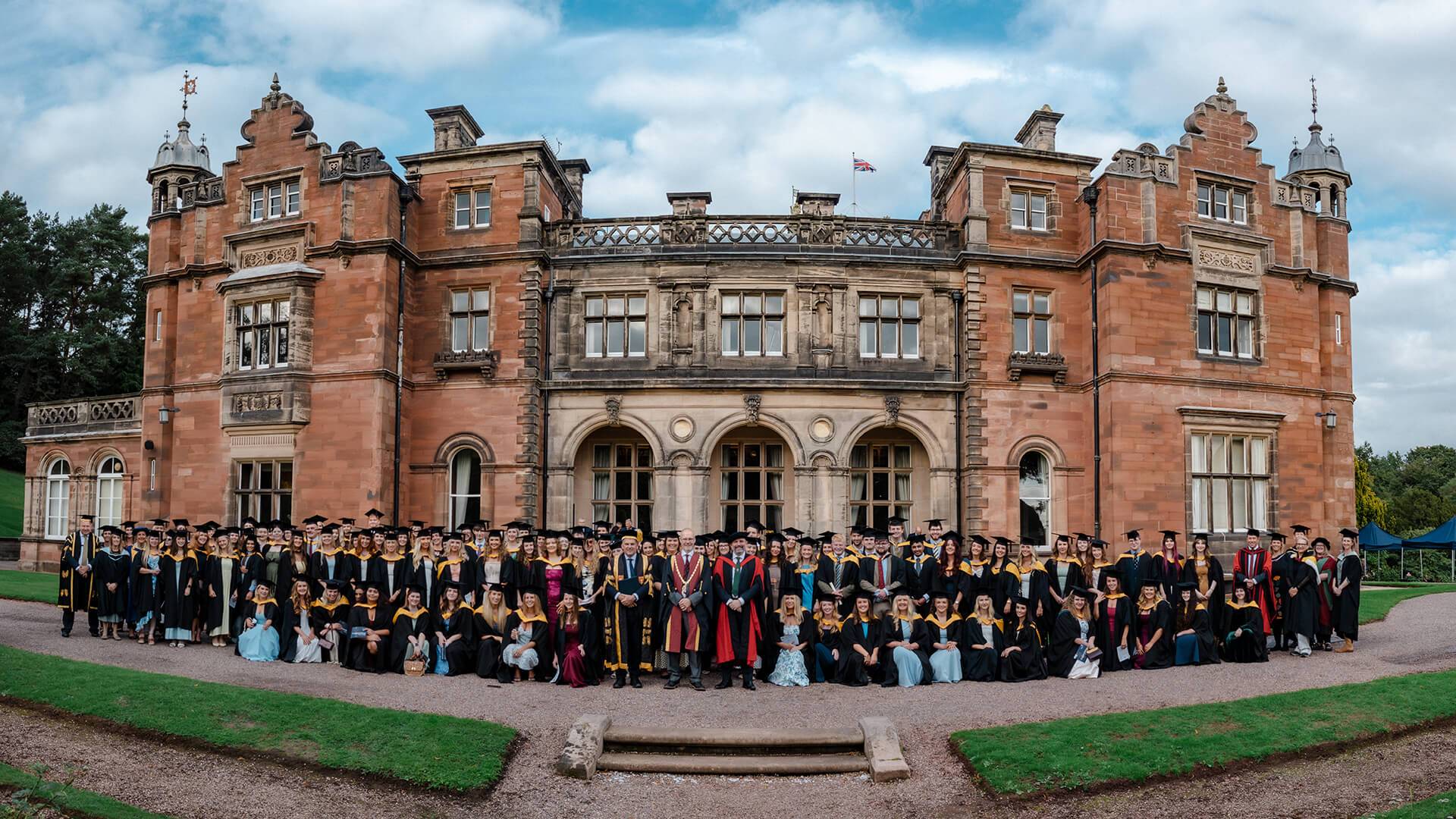HKVS Class of 2026 along with colleagues from Harper Adams University and Keele University standing outside Keele Hall. 