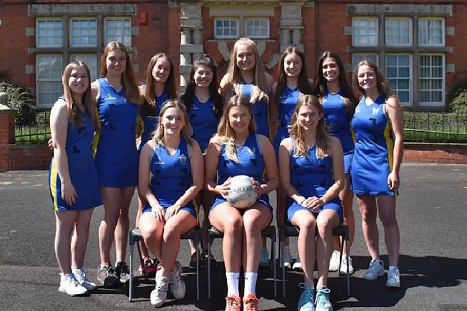 Harriet alongside the Harper Adams netball team